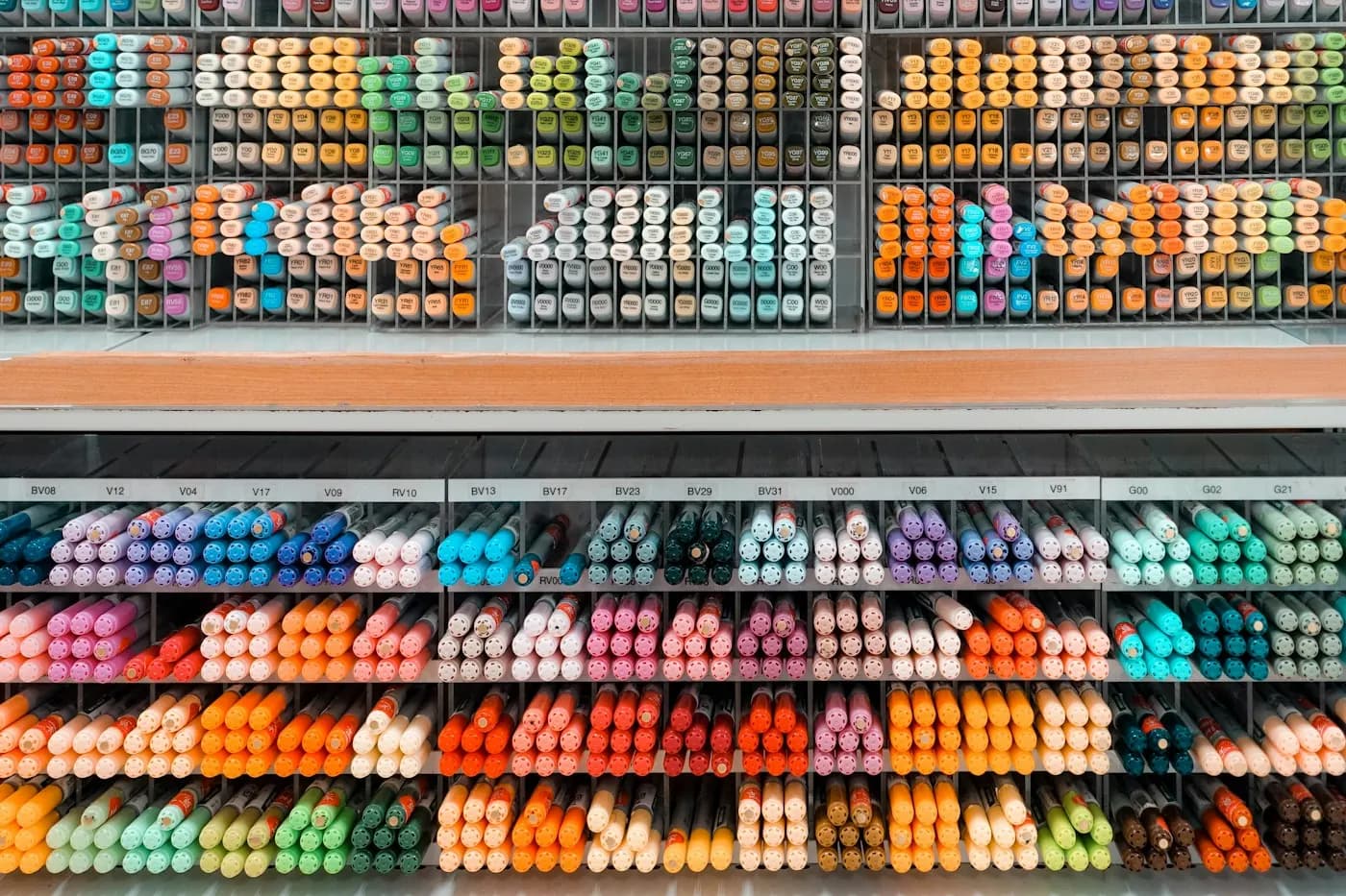 Rows of colourful marker pens on a shop rack
