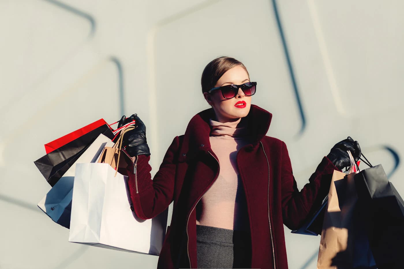Woman holding several shopping bags